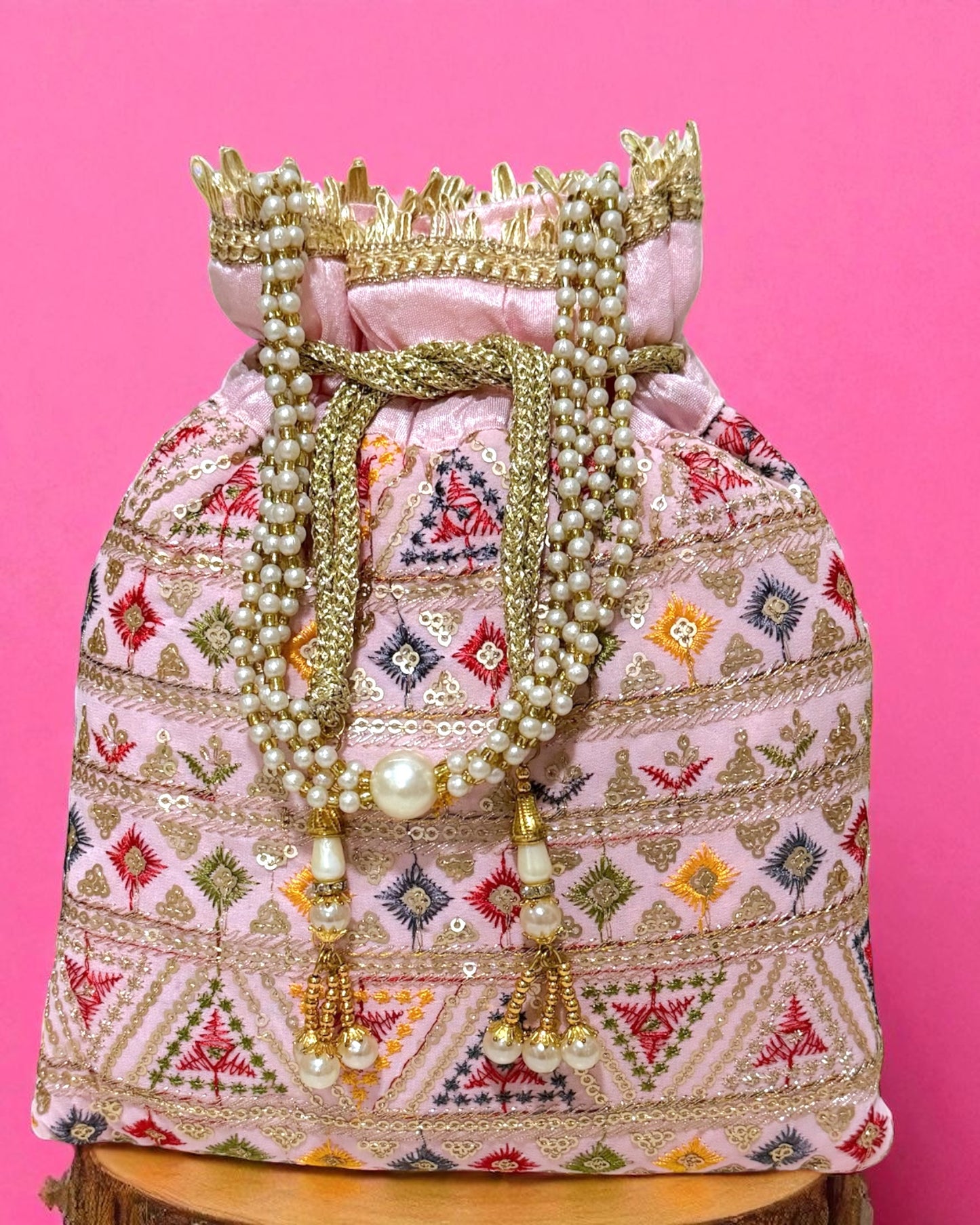Dalia داليا Embroidered Potli Bag in Pink