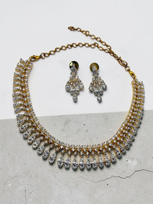 Aruna अरुणा Dainty American Diamond Set in Gold