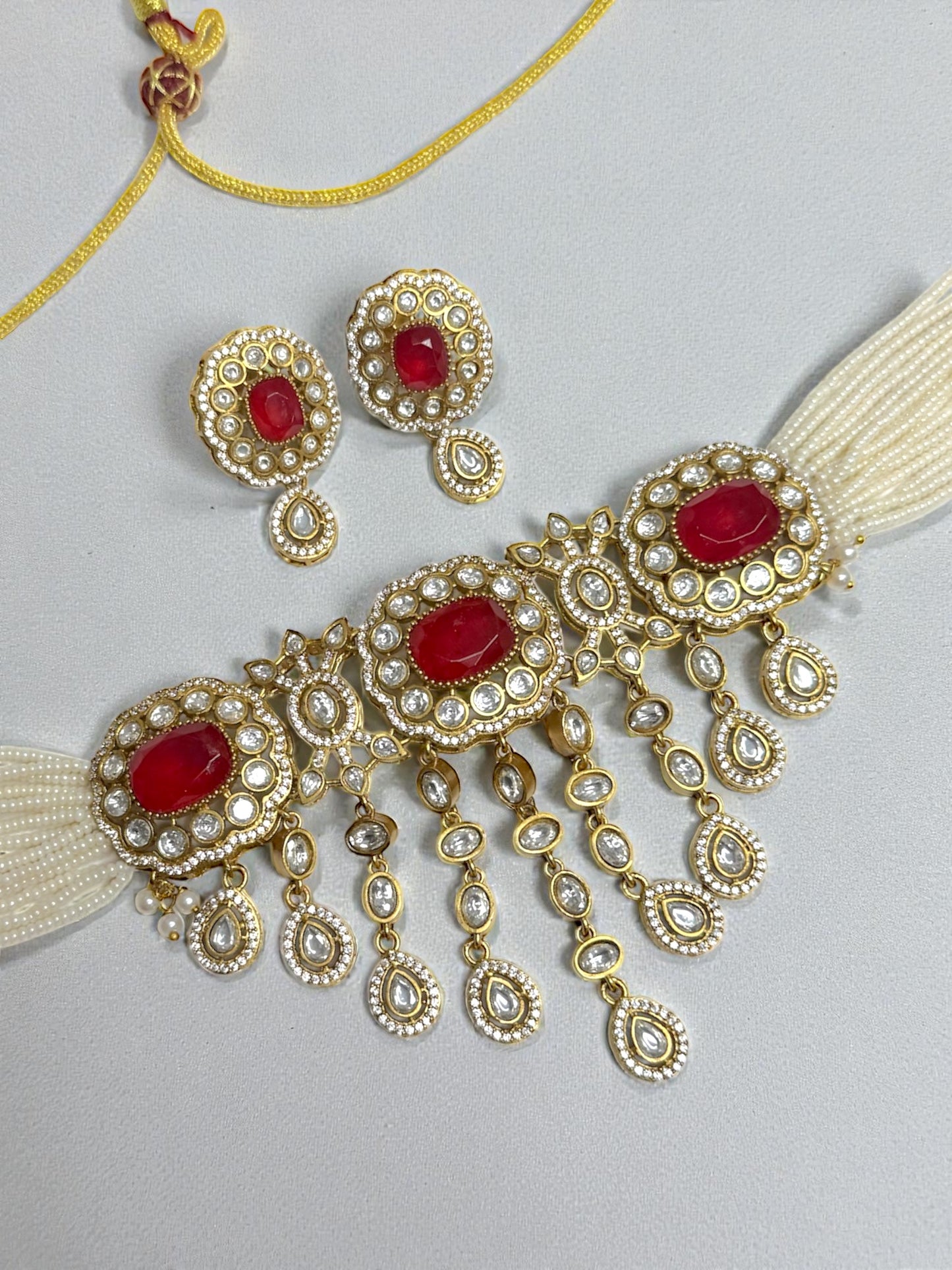 Ebtihal ابتهال Gold Plated Tyaani Kundan Choker Set with Doublet Stone in Red